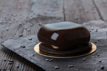 French mousse cake covered with mirror glaze