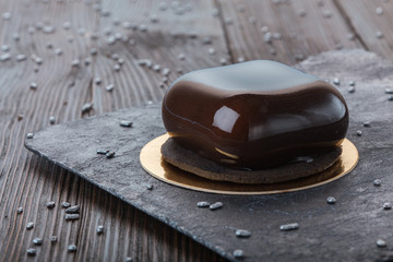 French mousse cake covered with mirror glaze