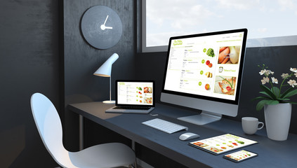 Navy blue workspace with responsive devices online supermarket responsive design website