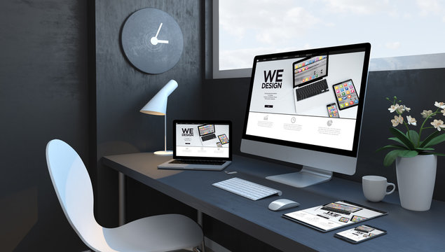 Navy blue workspace with responsive devices design website
