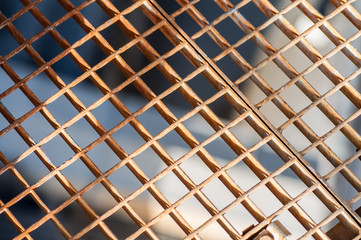 Rusted metal mesh. Steel corrosion