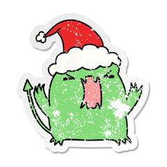 christmas distressed sticker cartoon of kawaii devil