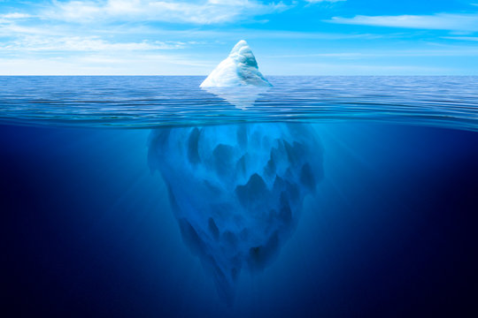 Tip of the iceberg. Underwater iceberg floating in ocean. Image montage.