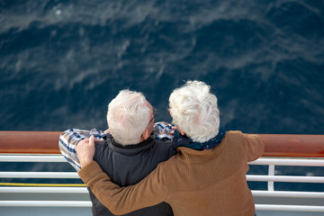 Older couple on a cruise vacation trip. - obrazy, fototapety, plakaty