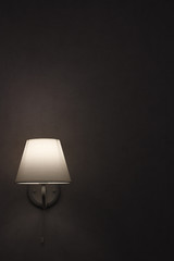 Wall lamp with white shade from canvas.