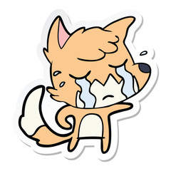 sticker of a crying fox cartoon