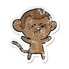 distressed sticker of a cartoon annoyed monkey