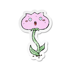 retro distressed sticker of a cartoon shocked flower