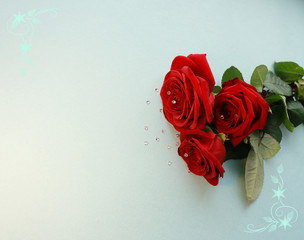 red roses for cards in the background