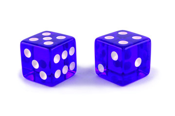 Two blue glass game dice very close up isolated on white background. Five and four with a shadow.