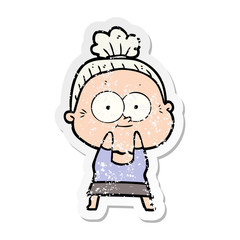 distressed sticker of a cartoon happy old woman