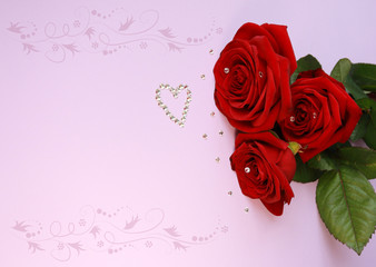 red roses for cards in the background