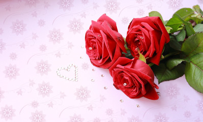 red roses for cards in the background