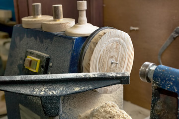 Lathe with wooden products and blanks close-up