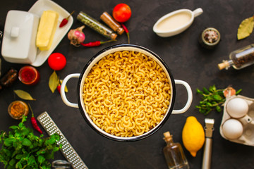 pasta, elbow and sauce (set of ingredients). top  food background. copy space