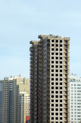 New, unfinished, residential buildings.
