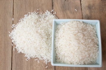 Thai jasmine rice on wood