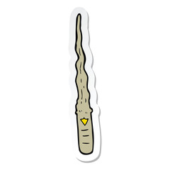 sticker of a cartoon magic wand