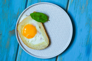 fried eggs in bread, scrambled eggs (yolk and white) sandwich. food background. top