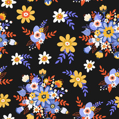 Folk floral seamless pattern in trendy modern style with different colorful flowers, branches and berries on a dark background. 