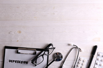 Panic attack and mental health awareness concept. Doctor's stethoscope, medical chart on clipboard,...