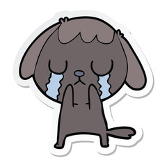 sticker of a cute cartoon dog crying