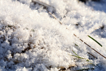 A frosty day after blizzard. Crystal snow, sharp snowflakes.