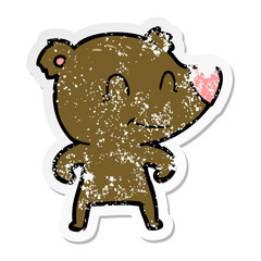 distressed sticker of a smiling bear cartoon