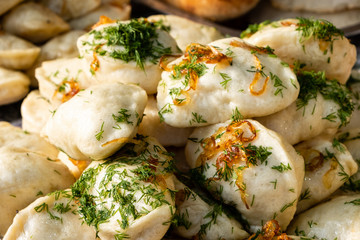 Traditional dumplings with fried onions at a street food festival