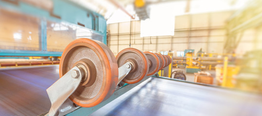 Steel Cutting Machine. Industrial machine for metel sheet coils cut, business concept