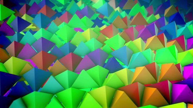 Jolly 3d rendering of rainbow pyramids placed on a slanted surface in straight and long rows with their sharp tops aimed up. It looks like an optimistic dolly out shot.