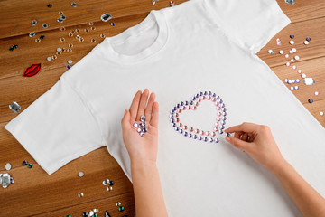 Woman laying out rhinestones