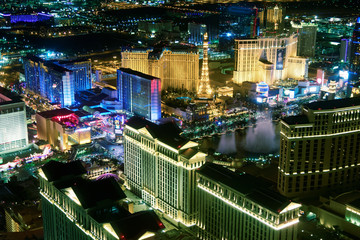 Casinos of Las Vegas with night show, aerial view  at night from helicopter © jovannig
