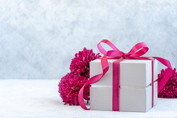 gift box with ribbon and flowers