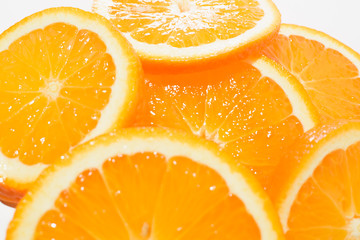 Fototapeta na wymiar Orange sliced on a white background