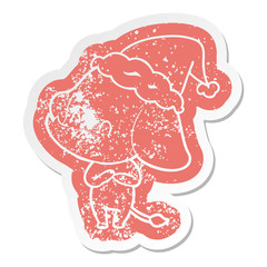 cute cartoon distressed sticker of a elephant wearing santa hat