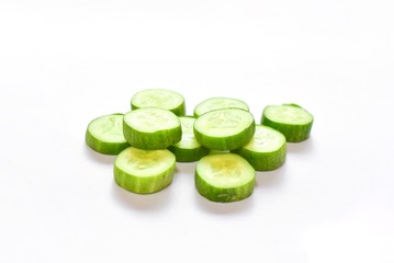 Sliced Cucumber Pieces on White Background