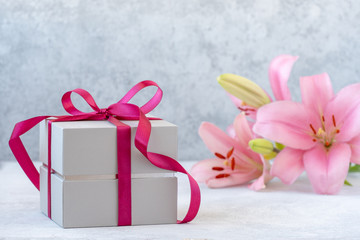 gift box with ribbon and flowers