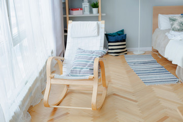 Fototapeta na wymiar Home interior in daylight. Furniture and decor in Scandinavian style. 