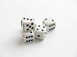 five old white dices on white background