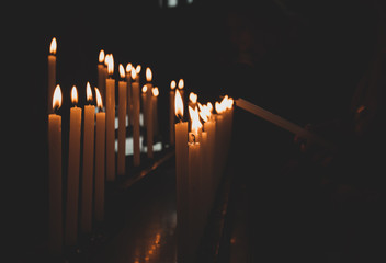Fototapeta na wymiar Candles in the church.