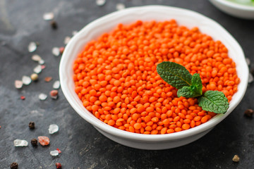 Lentils orange, healthy food concept (legumes, greens, spinach, micro greens and more) superfood. Food background