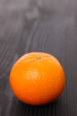 citrus tankan against black background