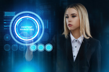 The concept of business, technology, the Internet and the network. A young entrepreneur working on a virtual screen of the future and sees the inscription: Content marketing