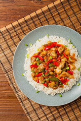 Chicken kung pao. Fried chicken pieces with peanuts and peppers.