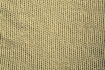 Fototapeta premium yellow knitting wool texture background