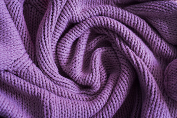 Fototapeta na wymiar purple knitting wool texture background