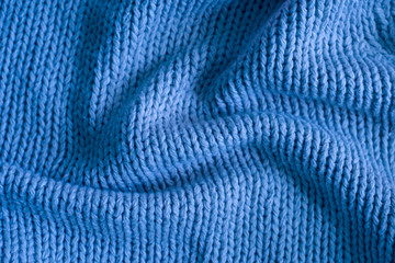 Fototapeta na wymiar Blue knitting wool texture background