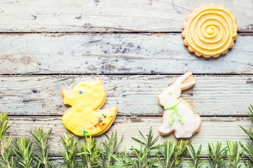 Easter homemade gingerbread cookie over white wooden table