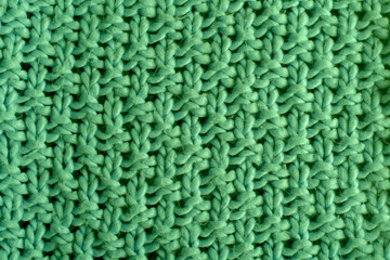 Green knitting wool texture background